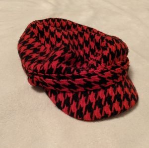 Red and black houndstooth pattern hat